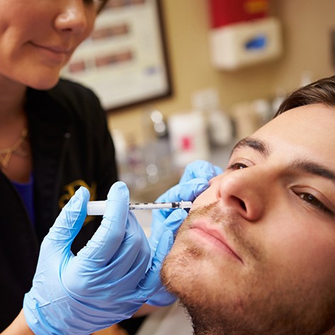 Patient receiving TMJ Therapy in Chicago