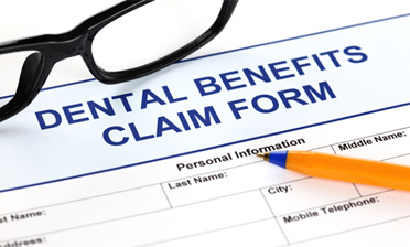 A dental insurance form for the cost of emergency dentistry in West Loop