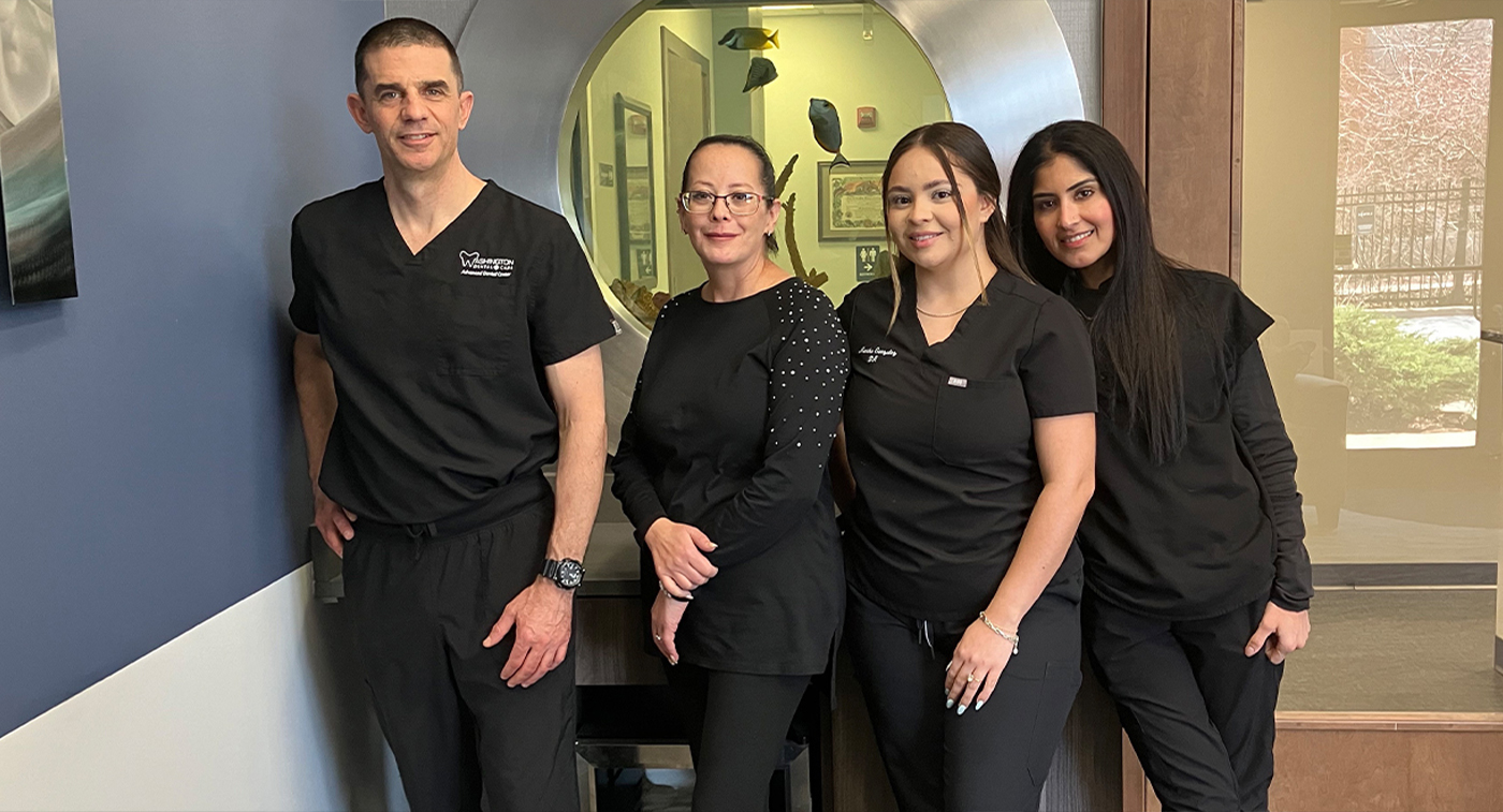 West Loop Chicago dentists and team members standing in dental office