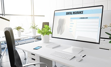 Dental insurance form on computer screen in office