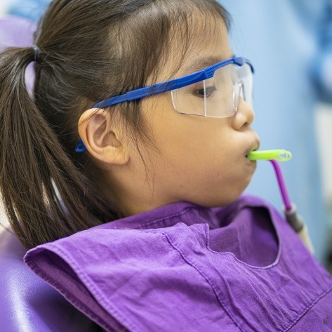 Patient receiving fluoride treatment