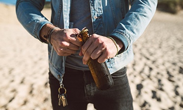 using bottle opener to prevent dental emergencies in West Loop Chicago