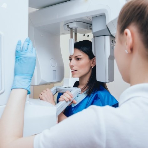 Patient receiving 3 D cone beam imaging scans